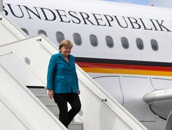 Podniebne zamieszanie nad Iranem. A w środku kanclerz Merkel