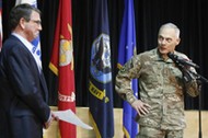 Terry introduces Carter to speak to troops at a question-and-answer session at Camp Arifjan, Kuwait