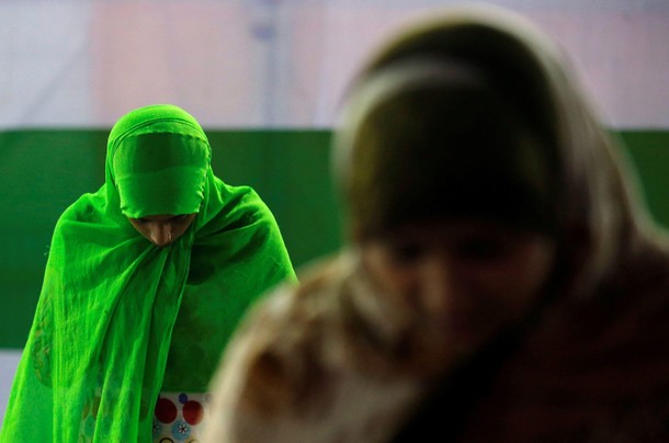 Muslim women take part in evening prayers called Tarawih, during the holy fasting month of Ramadan