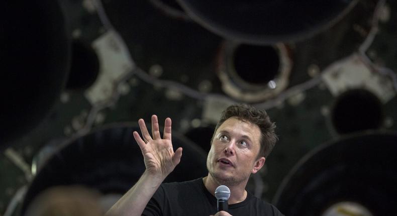 Elon Musk near a Falcon 9 rocket at SpaceX headquarters in Hawthorne, California in 2018.David McNew/Getty Images