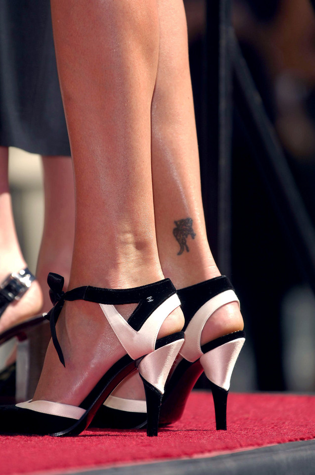 Symbolika tatuaży gwiazd: Charlize Theron