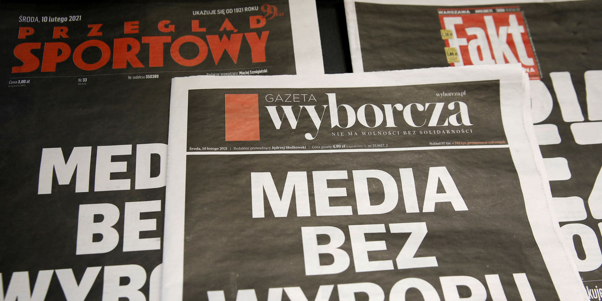 The first pages of Poland's main private newspapers have black front pages with the slogan 'Media wi