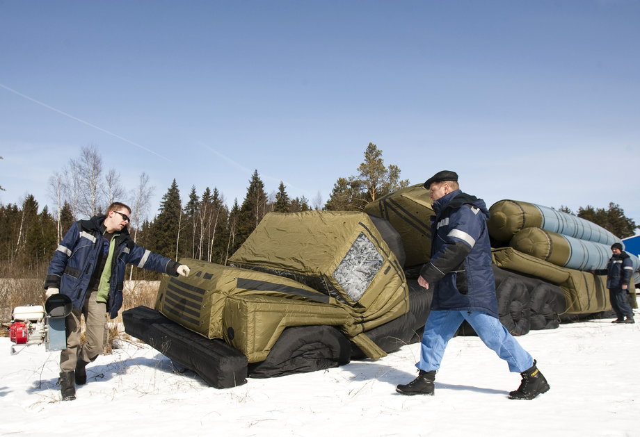 Workers inflate a model of a Russian S-300 long-range surface-to-air-missile system at the compound of the RusBal balloon manufacturer outside Moscow, April 8, 2009.
