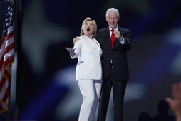 Democratic presidential nominee Hillary Clinton and her husband former president Bill Clinton react 