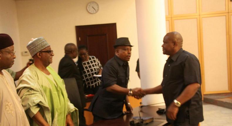 Governor Nyesom Wike exchanges pleasantries with Felix Obuah.