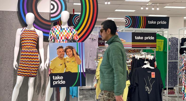 A customer walks by a Pride Month merchandise display at a Target store.Justin Sullivan/Getty Images