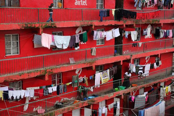 The Wider Image: Tearing down condemned homes in Nairobi