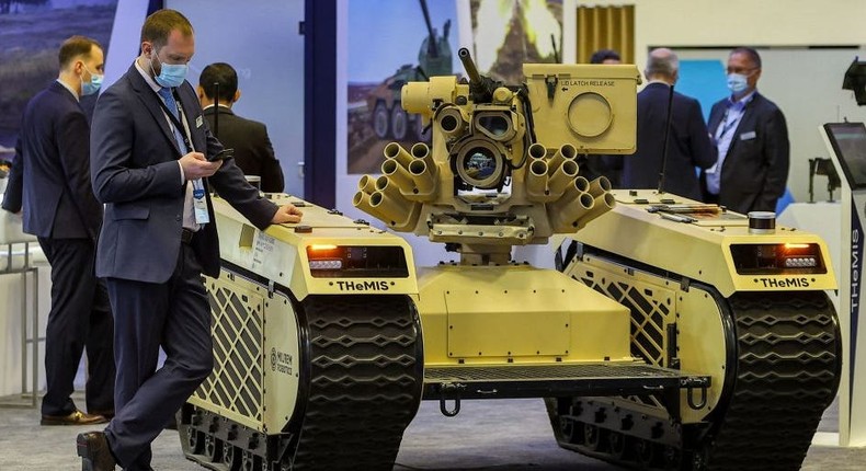 This picture taken on March 21, 2022 shows a view of Milrem Robotics' Estonian-built THeMIS (Tracked Hybrid Modular Infantry System) unmanned ground vehicle (UGV) on display at the Doha International Maritime Defence Exhibition (DIMDEX), in Qatar's capital Doha.KARIM JAAFAR/AFP via Getty Images