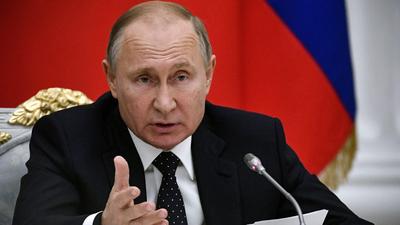Russia's President Putin attends a meeting with businessmen in Moscow