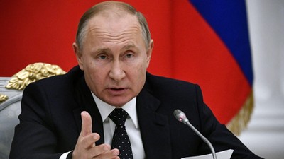 Russia's President Putin attends a meeting with businessmen in Moscow