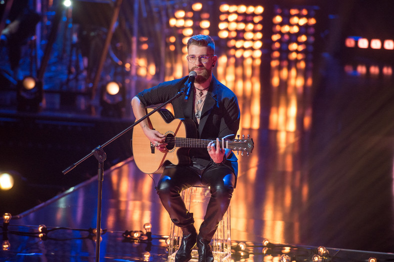 "The Voice of Poland". Adam Kalinowski z drużyny Tomsona i Barona z Afromental