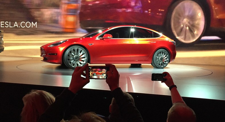 Tesla unveiling the lower-priced Model 3 sedan in 2016.