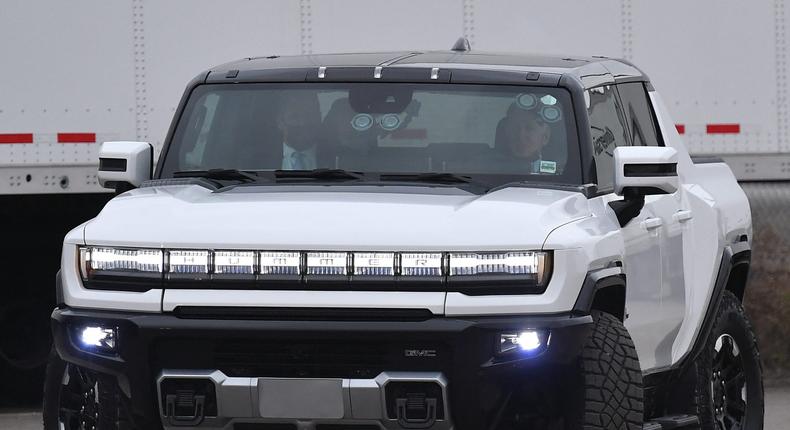 Joe Biden test drives an electric Hummer at GM's Detroit factory in November 2021.