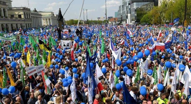 Tens of thousands of demonstrators attend the “Freedom March in Warsaw, saying the rule of law is at stake