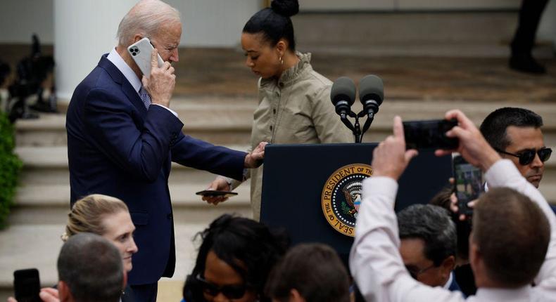 President Joe Biden takes a phone call at the conclusion of an event marking National Small Business Week in the Rose Garden at the White House on May 01, 2023, in Washington, DC.Chip Somodevilla/Getty Images