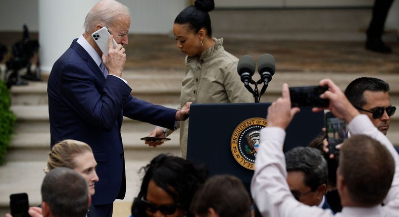 President Joe Biden takes a phone call at the conclusion of an event marking National Small Business Week in the Rose Garden at the White House on May 01, 2023, in Washington, DC.Chip Somodevilla/Getty Images