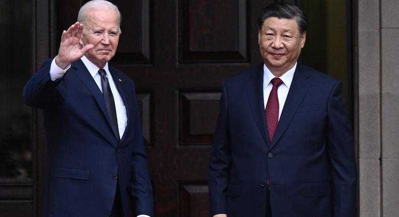 US President Joe Biden greets Chinese President Xi Jinping before a meeting during the Asia-Pacific Economic Cooperation (APEC) Leaders' week in Woodside, California on November 15, 2023.BRENDAN SMIALOWSKI/AFP via Getty Images)