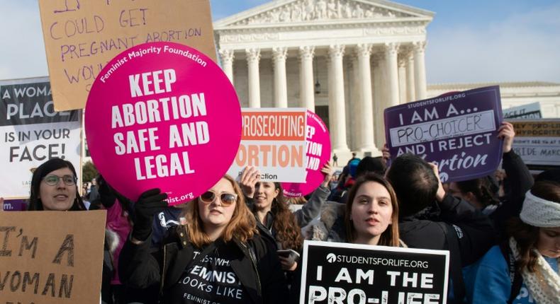 Abortion rights supporters and opponents mark the anniversary of the decision in Roe vs Wade, the 1973 Supreme Court case that legalized abortion in the US