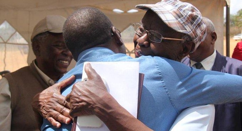 File image of Prof Mbiti hugging former CJ willy Mutunga