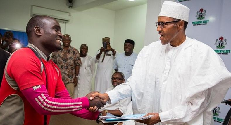 Suleiman Hashimu being congratulated by PMB on the completion of his first mission