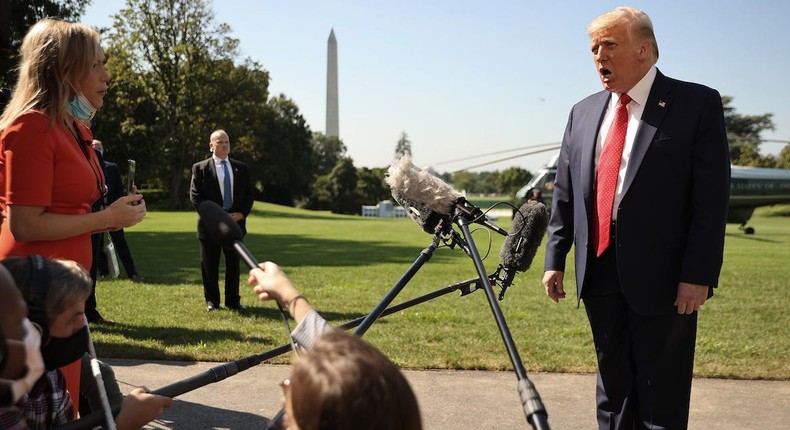 U.S. President Donald Trump talks to reporters as he leaves the White House for a trip to Minnesota and Wisconsin August 17, 2020 in Washington, DC.
