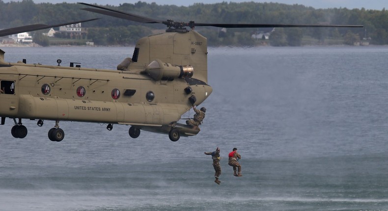 US soldiers conduct helocast training in the Black River Bay in New York, September 14, 2018.