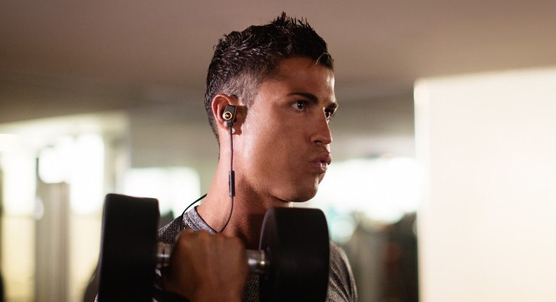 Star footballer, Cristiano Ronaldo using one of the earphones