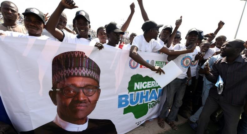 Supporters of President Buhari at  a rally [Punch]