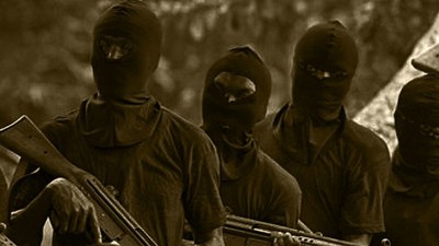 Unknown gunmen in face mask - Illustration purpose