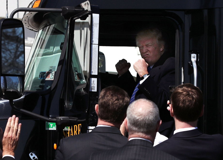 Donald Trump poses in a truck outside the White House in March 2017.