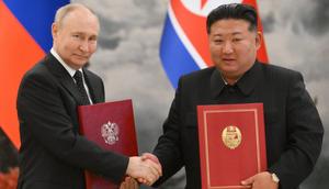 Russian President Vladimir Putin shakes hands with North Korea's leader Kim Jong Un after a signing ceremony following their bilateral talks at Kumsusan state residence in Pyongyang, on June 19, 2024.KRISTINA KORMILITSYNA/Getty Images