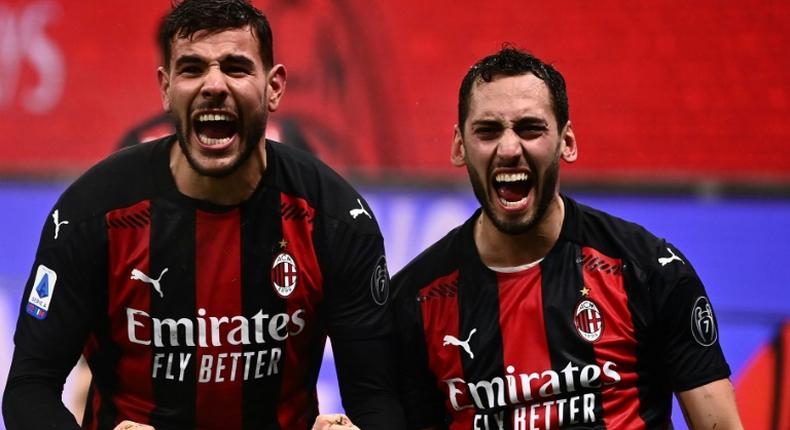 AC Milan's French defender Theo Hernandez (left) and Turkish midfielder Hakan Calhanoglu (right) have both tested positive for Covid-19