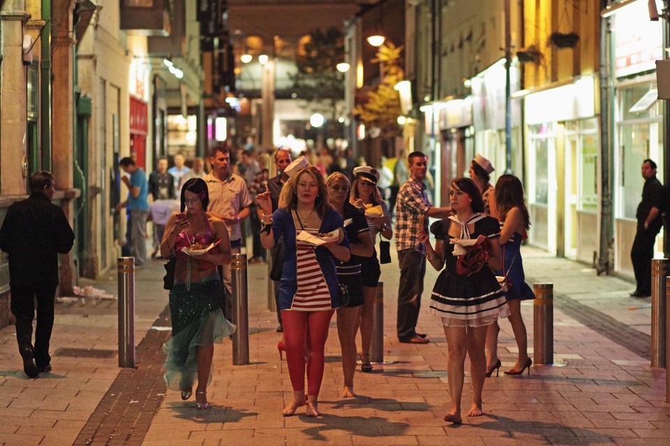 Saturday Night Revellers Enjoy Themselves In Cardiif City Centre