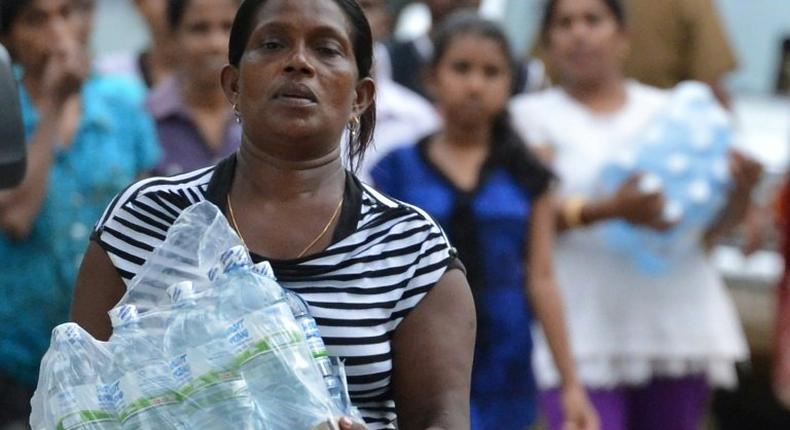 Sri Lanka has appealed for volunteers to help with a massive recovery operation in the wake of devastating flooding that left 183 dead and tens of thousands without clean drinking water