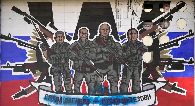 A mural depicting mercenaries of Russia's Wagner Group that reads: Wagner Group - Russian knights.AP Photo/Darko Vojinovic