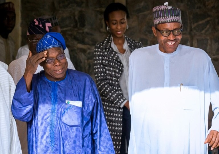 Happier times: Obasanjo, left, chats with Buhari, then president-elect, after the 2015 elections (The Nation) 