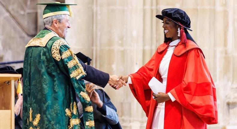 Tiwa Savage being awarded a doctorate degree in Music