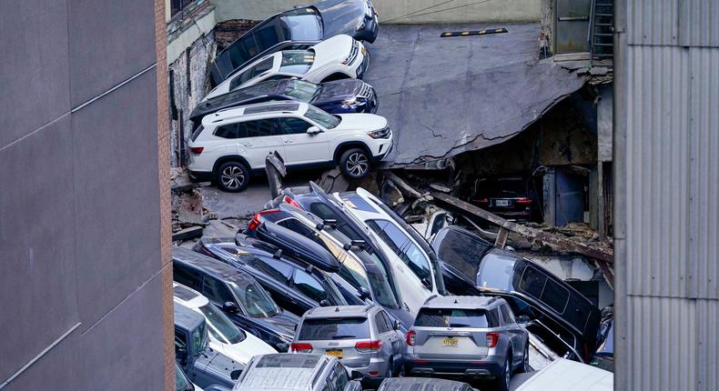 Building officials concluded that all three levels of the nearly 100-year-old garage either completely or partially collapsed on April 18.Mary Altaffer/AP