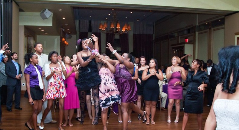 Airborne ladies trying to catch the bouquet