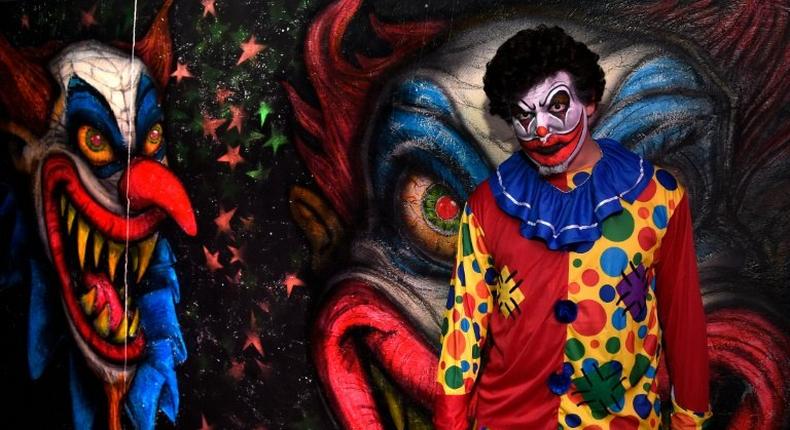 Armando Santana, who performs as a scary clown in a haunted house in Miami, Florida, says he no longer wears his costume in public after creepy clown sightings spread across the US