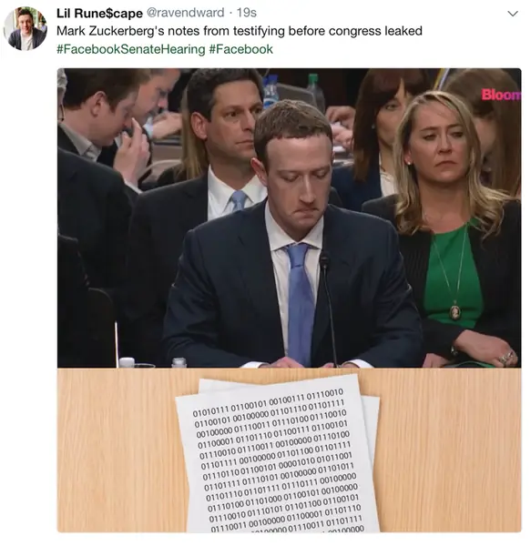 Mark Zuckerberg przegląda notatki podczas przesłuchania przed komisją