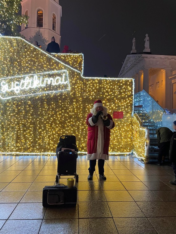 Saint Santa Claus plays at the fair