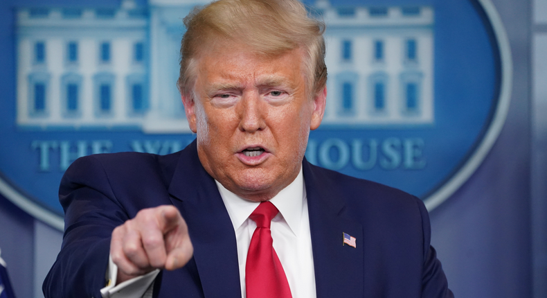 U.S. President Donald Trump points at a reporter as he talks about the Department of Health and Human Services Inspector General's report on the shortage of novel coronavirus tests for hospitals during the daily coronavirus task force briefing at the White House in Washington, U.S., April 6, 2020. REUTERS/Kevin Lamarque