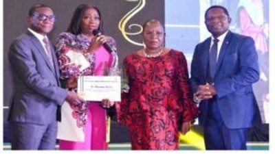 L-R; Lamin Barrow AfDB Nigeria received the award on behalf of Adesina (Credit: NAN)
