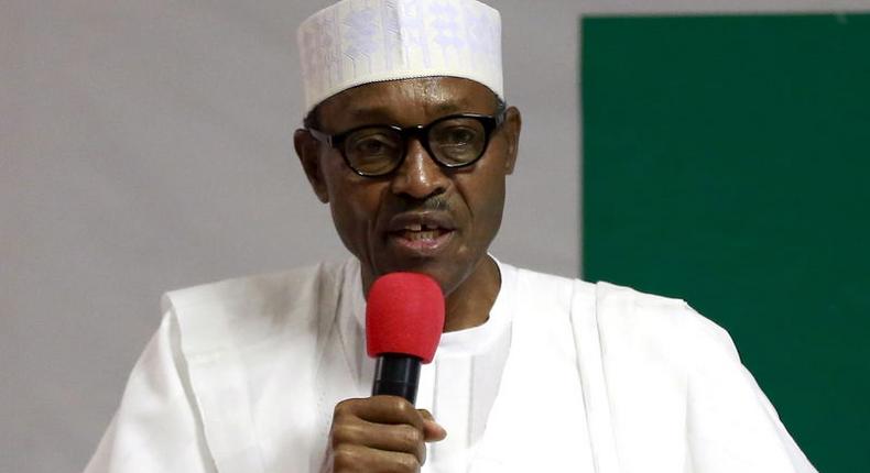 President Muhammadu Buhari addresses members of the National Working Committee during the meeting of the All Progressives Congress (APC) party at the headquarters of the party in Abuja, Nigeria July 3, 2015. REUTERS/Afolabi Sotunde