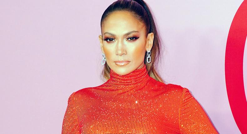 J.Lo Shows Off Toned Abs And Back In New Photos