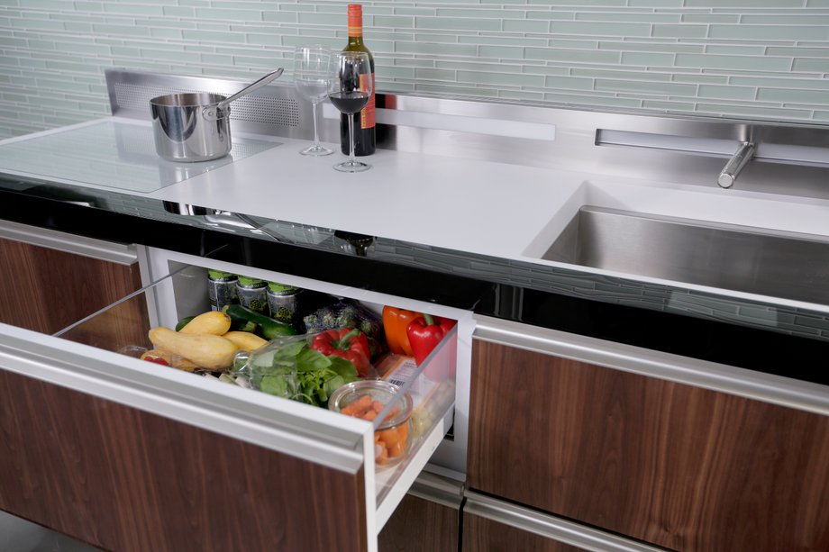 GE's Micro Kitchen wants to help you live large in a small space. The compact refrigeration, cleaning, and microwave units save space and reduce the user's environmental footprint.