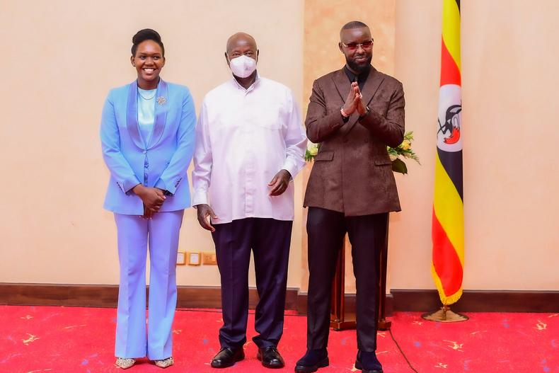 Phiona Nyamutoro and Eddy Kenzo posing with President Yoweri Museveni