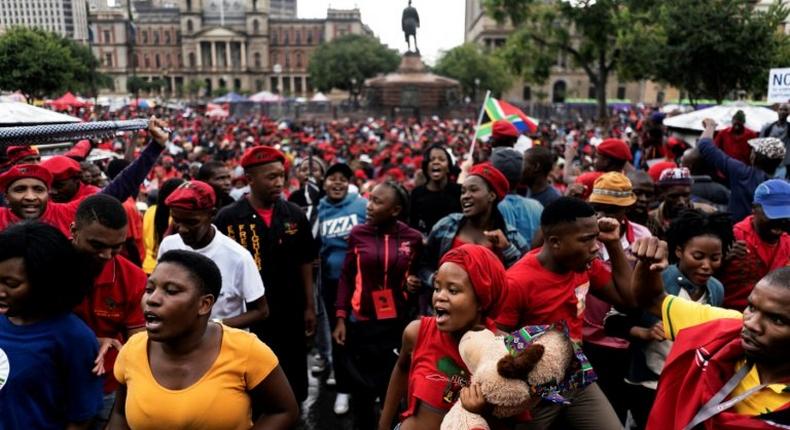 Opposition activists gather in Pretoria, on April 12, 2017 ahead of a march calling for the ousting of South Africa's embattled President Jacob Zuma