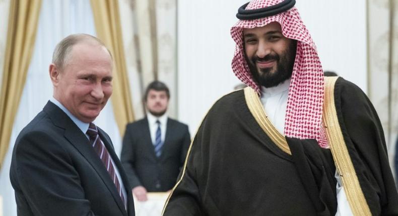 Russian President Vladimir Putin (left) shakes hands with Saudi Deputy Crown Prince Mohammed bin Salman during a meeting at the Kremlin in Moscow, on May 30, 2017